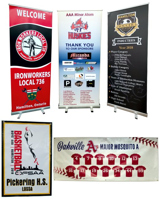 A collection of custom-printed event banners, including a pop-up stand and hanging banner from Aran Awards