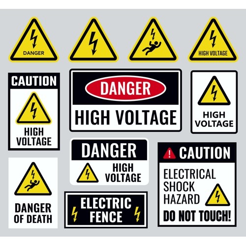 A collection of heavy-duty, custom-engraved safety and warning labels for an industrial facility.