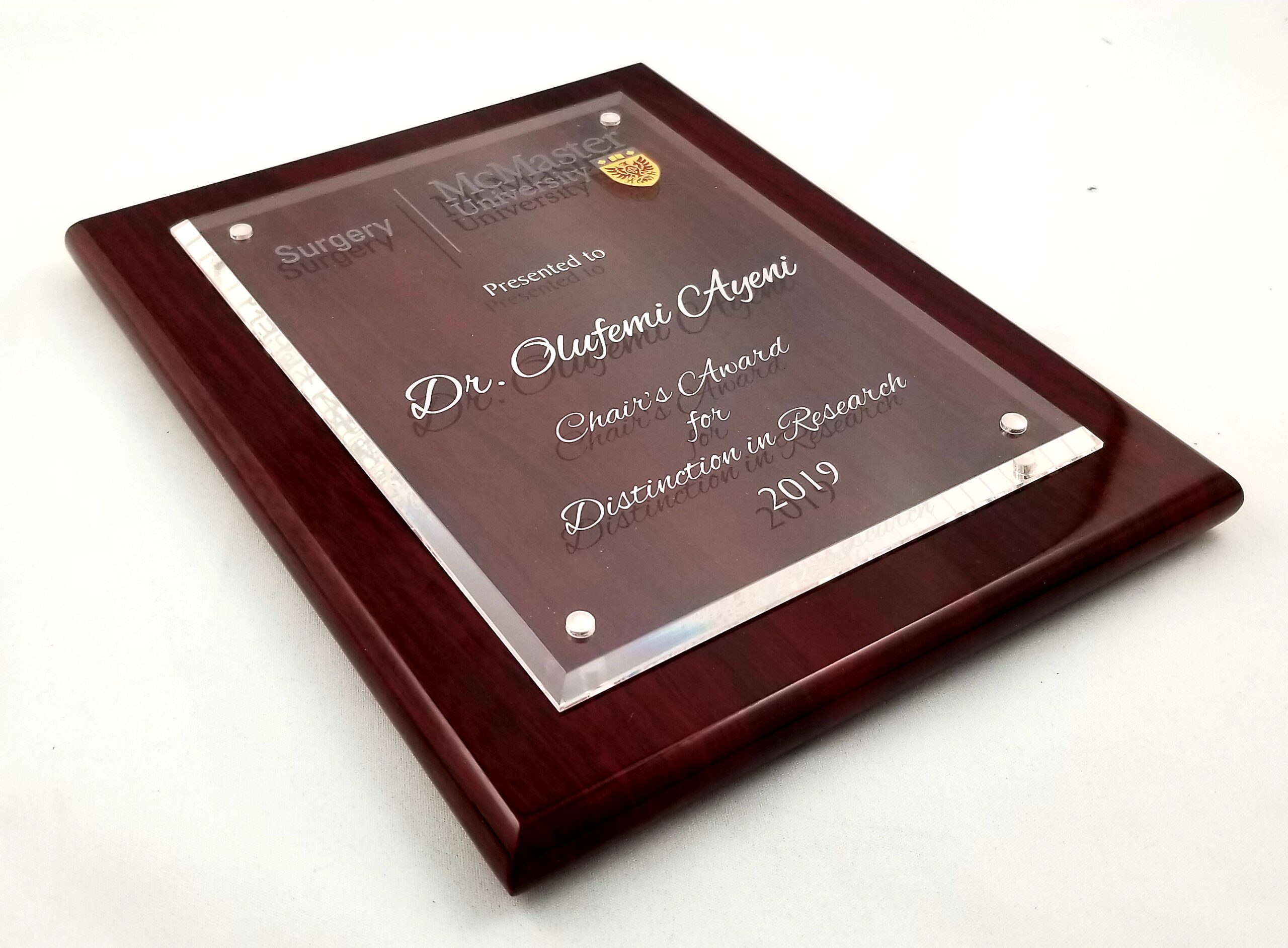 Custom engraved award plaques on display from Aran Awards