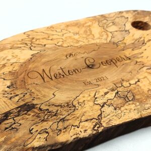 Custom engraved spalted wood charcuterie board with 'Weston-Cooper' and 'Est. 2021' design by Aran Awards Hamilton.