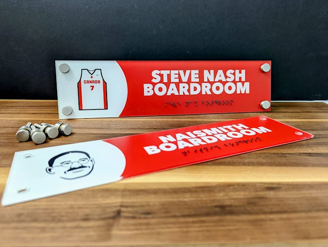 Custom UV-printed acrylic sign mounted with standoffs from Aran Awards