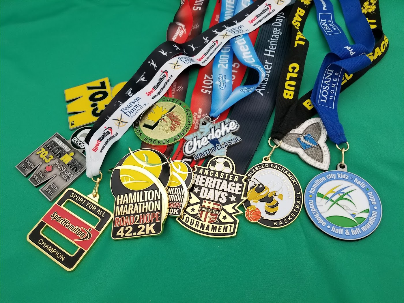 Event medals with ribbons from Aran Awards in Hamilton